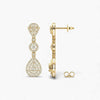 Gold earrings with diamond accents on a white background