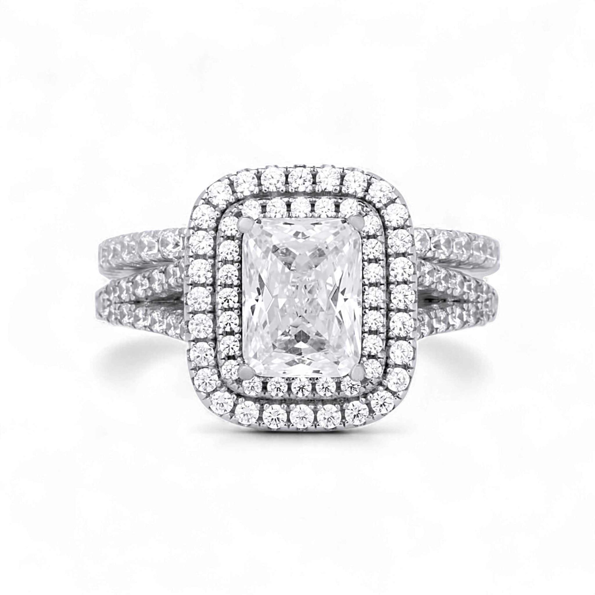Kylie Radiant Cut CZ bride set sterling silver ring with radiant-cut cubic zirconia centerpiece and halo design