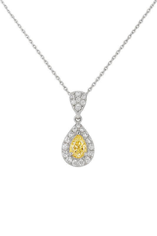 Teardrop-shaped pendant with yellow center and diamond accents on a white background