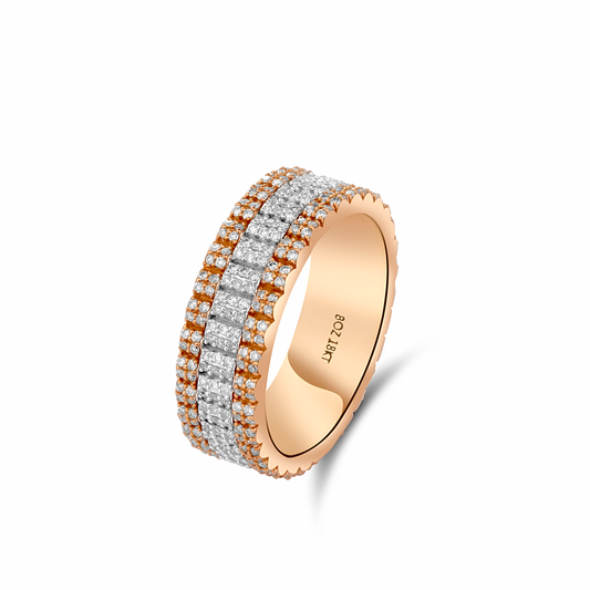 Rose gold ring with diamond accents on a white background