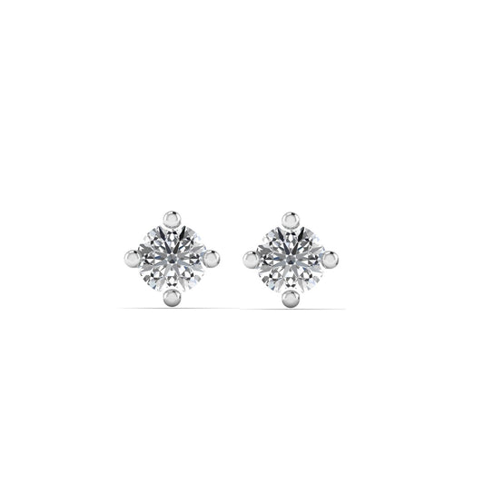 Pair of diamond stud earrings on a white background