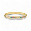 Gold bracelet with colorful gemstones on a white background