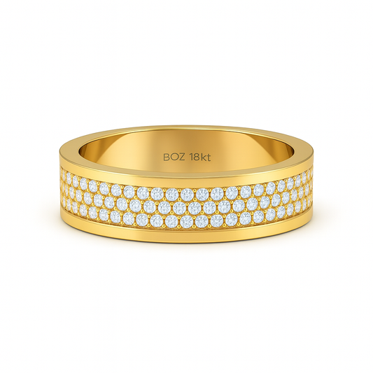 Gold ring with diamond accents on a white background