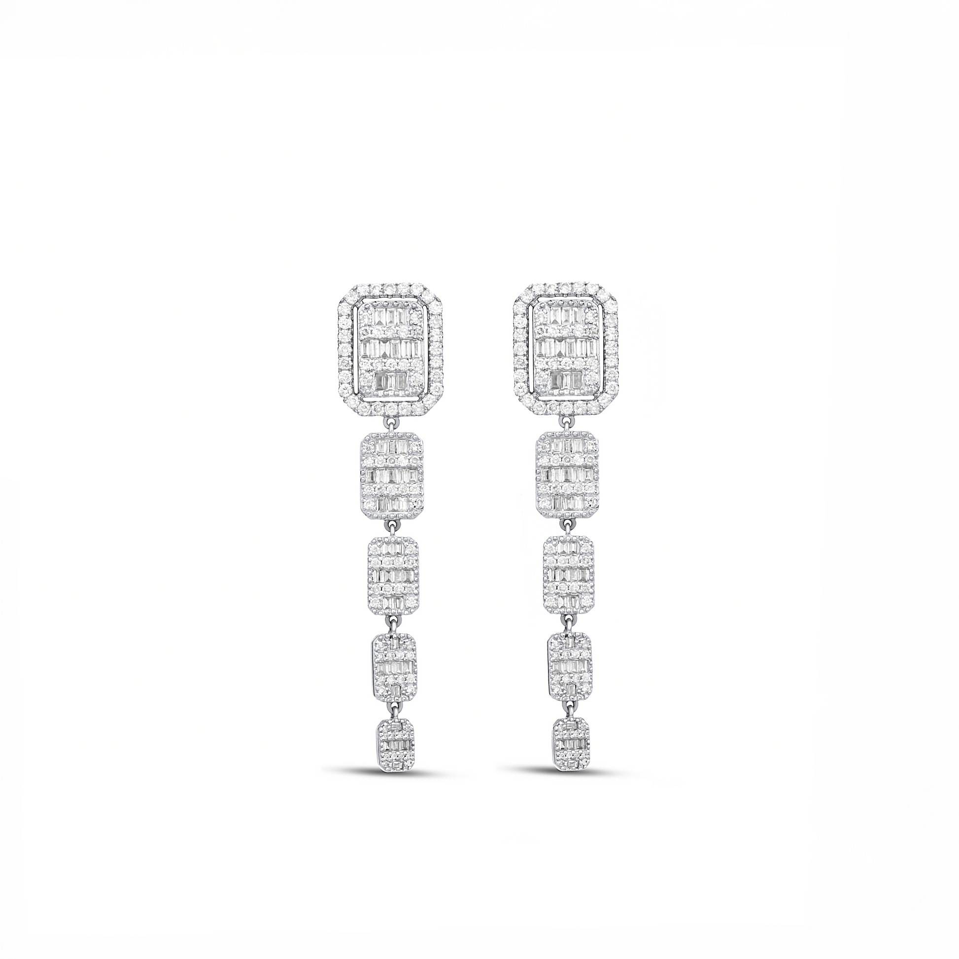 Pair of diamond earrings on a white background