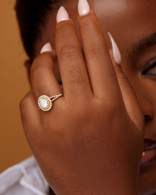 Kylie Oval Cut Moissanite and Diamonds Engagement Ring in 18K Gold