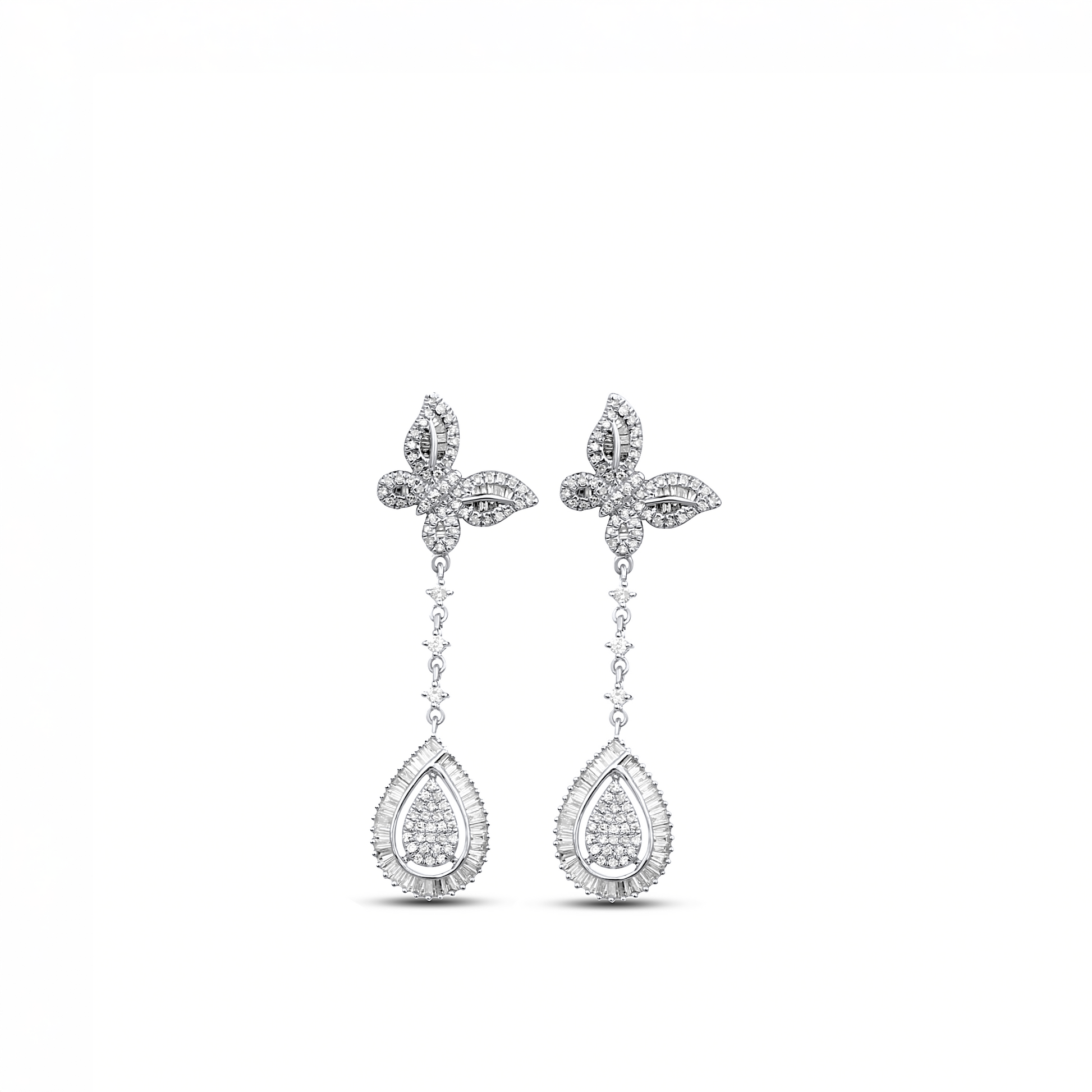 A pair of white gold tear drop earrings with diamonds, designed in the shape of butterflies, attached to the top of the drops.